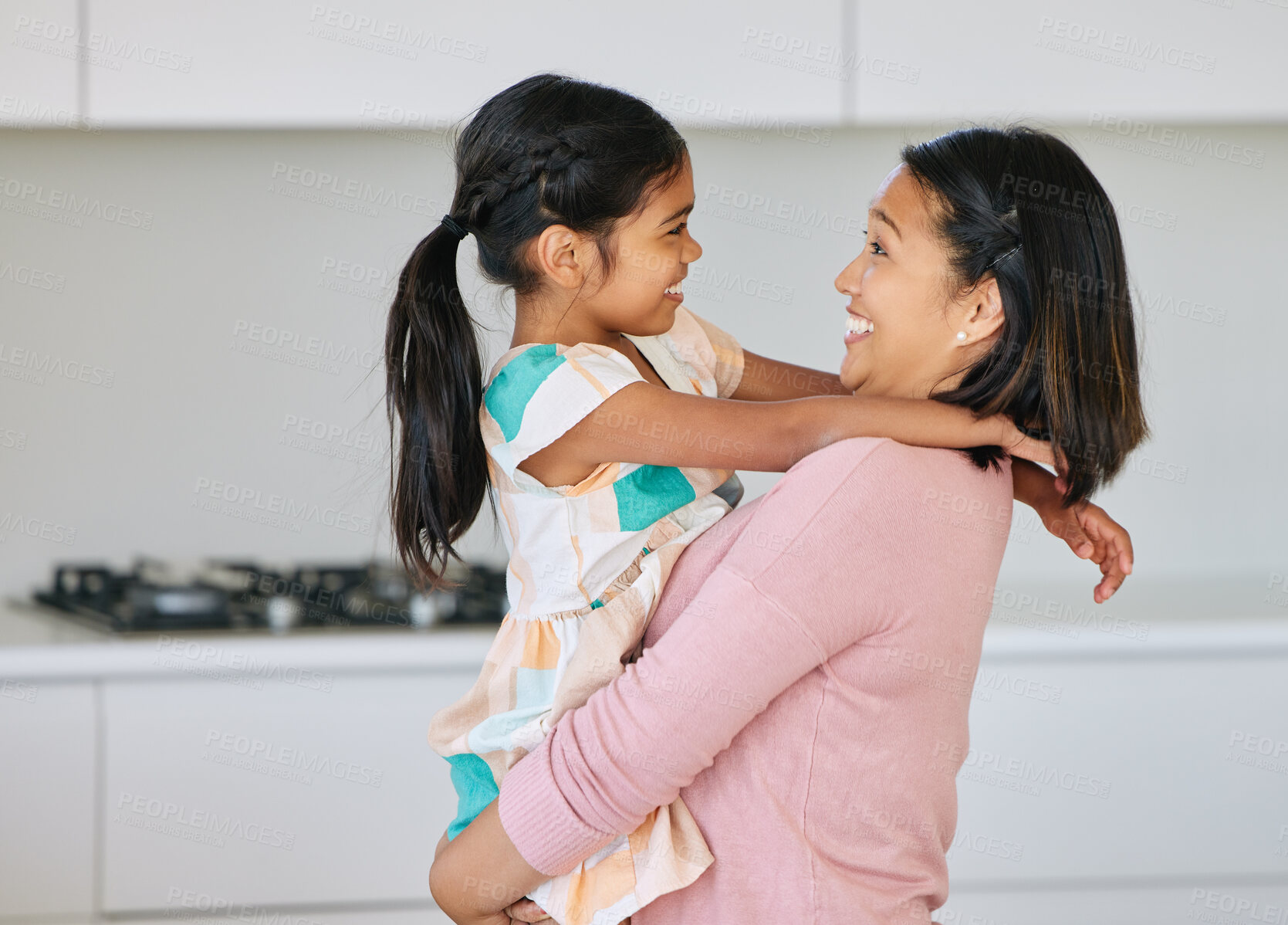 Buy stock photo Asian mom, girl and happy with bonding in kitchen for support, love and growth or child development. Parent, kid and smile at home as family, childhood memories and fun together with care and trust