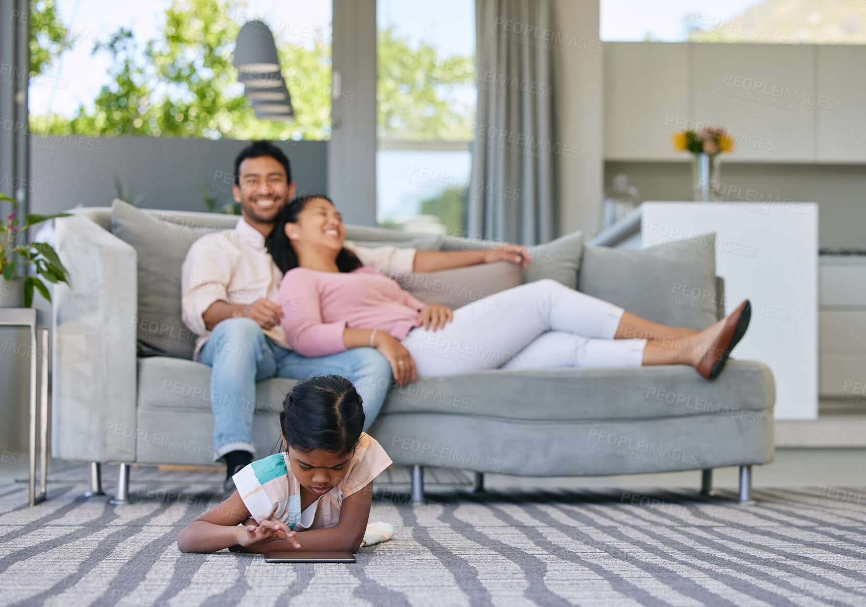 Buy stock photo Family, kids and tablet in living room for bonding, love and digital for child development. Parent, girl and smile at home with care, childhood memories and together with trust, play and support