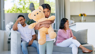 Buy stock photo Couple, fighting and sad in child home, living room and girl with teddy bear for support and comfort in family conflict. Parents, divorce and marriage problems, childhood trauma and disagreement