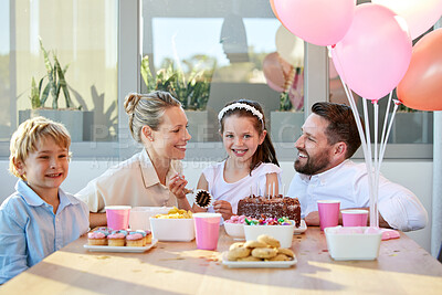 Buy stock photo Shot of a little girl celebrating her birthday at home