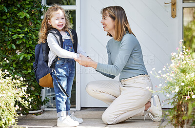 Buy stock photo Shot of a mother and daughter getting ready to have some fun at home