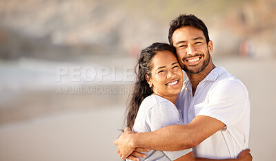 Buy stock photo Shot of a couple hugging on the beach