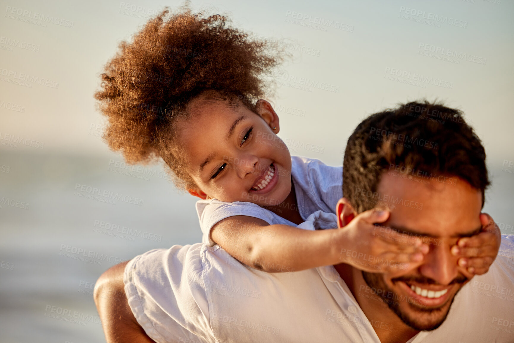 Buy stock photo Father, child and hands on eyes for piggyback, bonding and care with parent and girl or playful in nature on holiday. Relax, happy and family vacation for ocean fun, smile and childhood and together