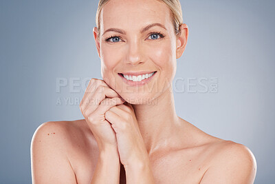 Buy stock photo Glow, skincare and portrait of woman in studio for facial, cosmetics and natural makeup. Self care, wellness and mockup with face of female model on grey background for beauty, happiness and collagen