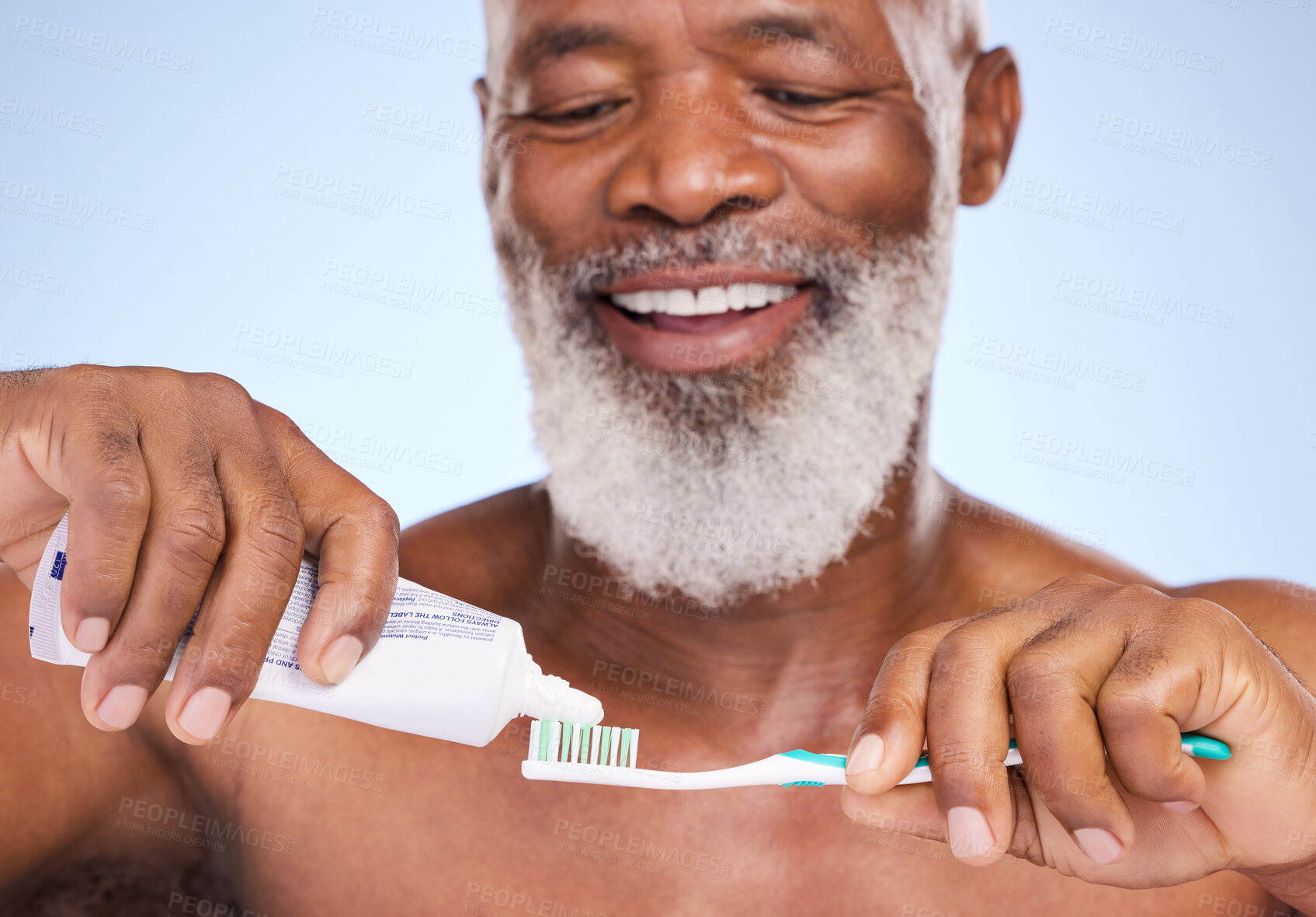 Buy stock photo Toothpaste, smile and black man for dental health, studio or oral hygiene on blue background. Grooming, clean or routine with toothbrush for person, beauty or cosmetic for healthy or fresh breath