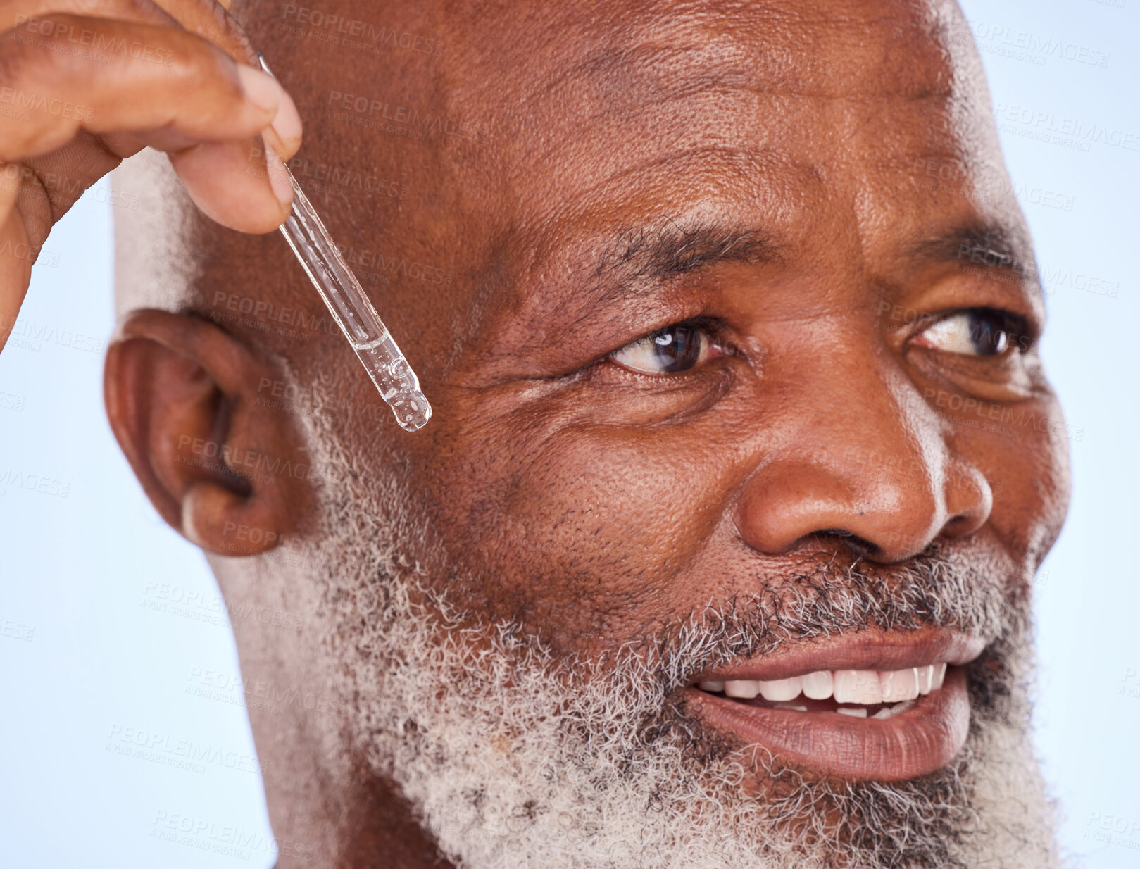 Buy stock photo Senior, black man and skincare with essential oil in studio with pipette for moisture, balanced hydration and anti aging protection. Person, natural serum and collagen for firm skin, zoom and smile.