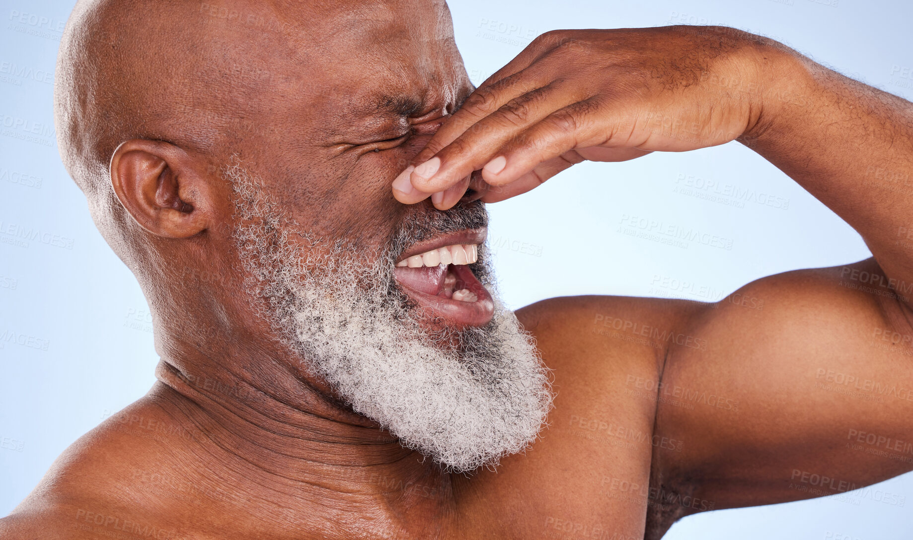 Buy stock photo Disgust, African man and holding nose in studio for body scent and bad or dirty smell. Mature, male person and treatment for gastro, colon cancer and problem or food intolerance or bacteria in bowel