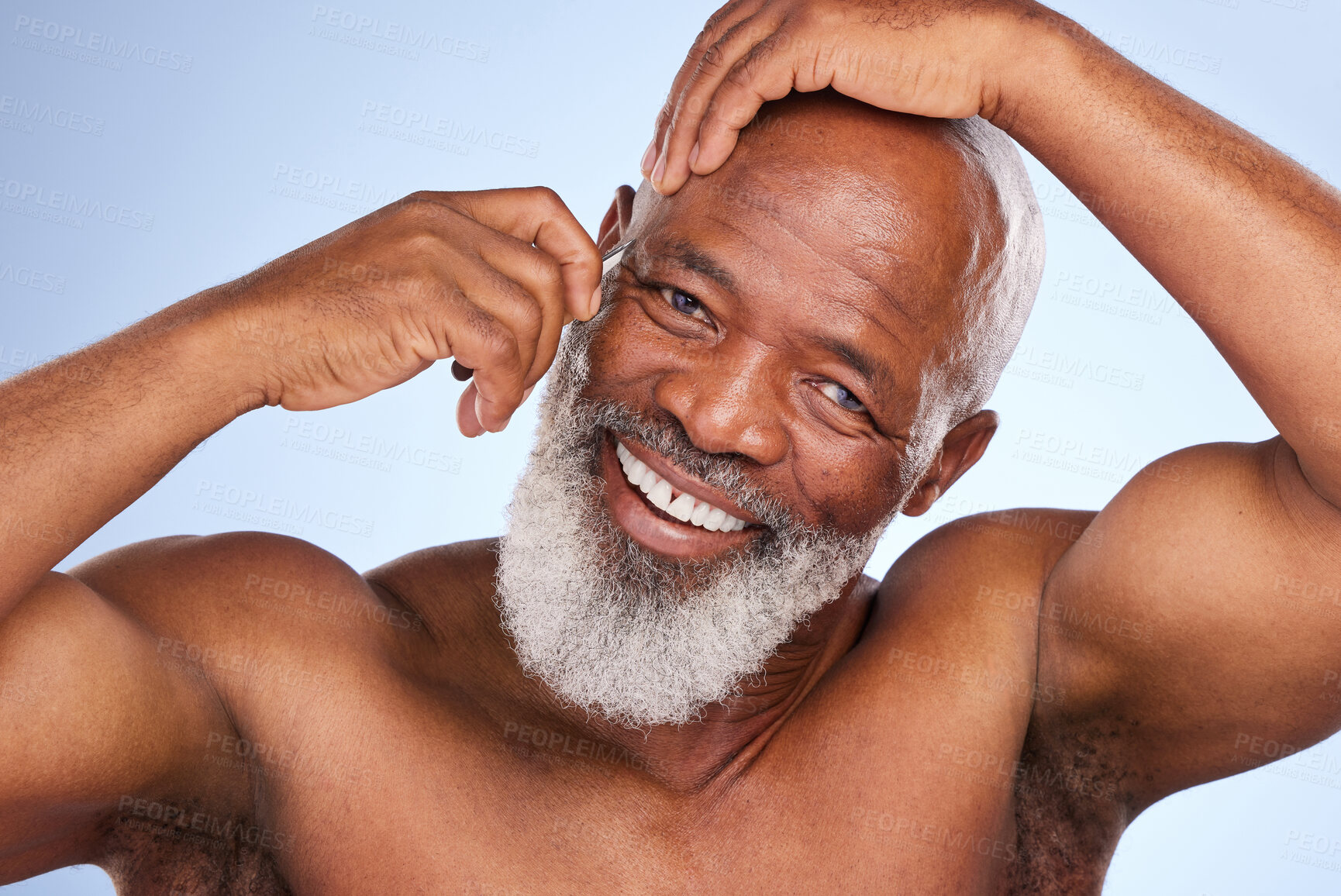 Buy stock photo Black man, studio and eyebrow for hair removal, selfcare and grooming for epilation on blue background. Beauty, arms and hygiene for portrait of male person, cosmetic or smile for fresh skin and face