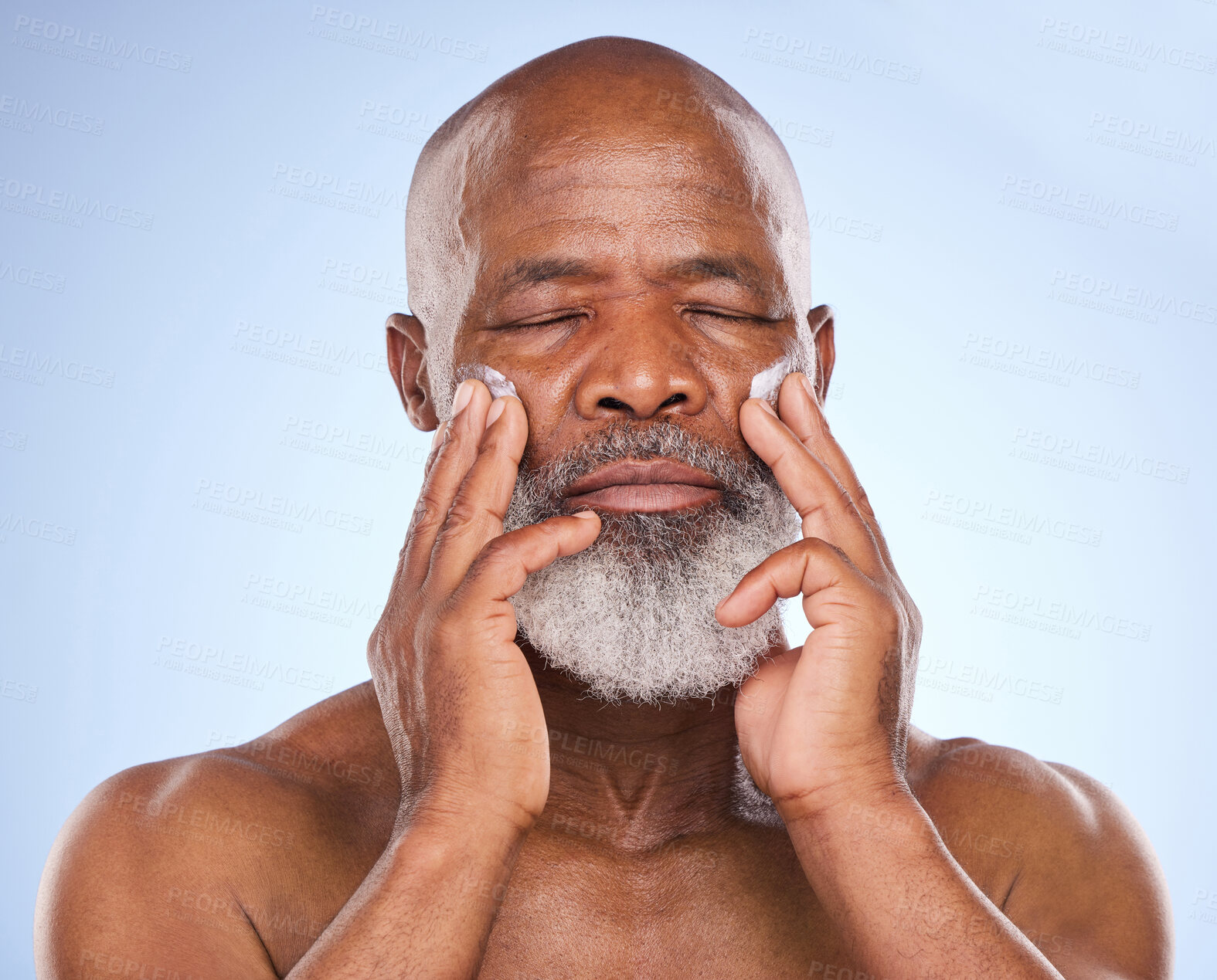 Buy stock photo Skincare, cream and beauty with black man in studio for sunscreen anti aging or spa. Cosmetics, mockup or self care with lotion on face of senior model on blue background for facial and product