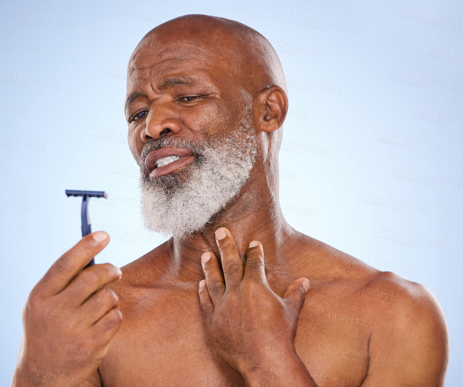 Buy stock photo Accident, shaving and man with beard in studio for grooming, hair removal or self care treatment. Injury, clean and mature male person with shaver for facial epilation routine by white background.