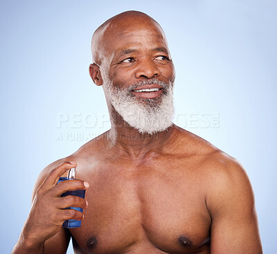 Buy stock photo Black man, perfume and smile for beauty in studio, fragrance and smell for hygiene on blue background. Cosmetic, shirtless and mature male person, product or cologne for luxury deodorant spray