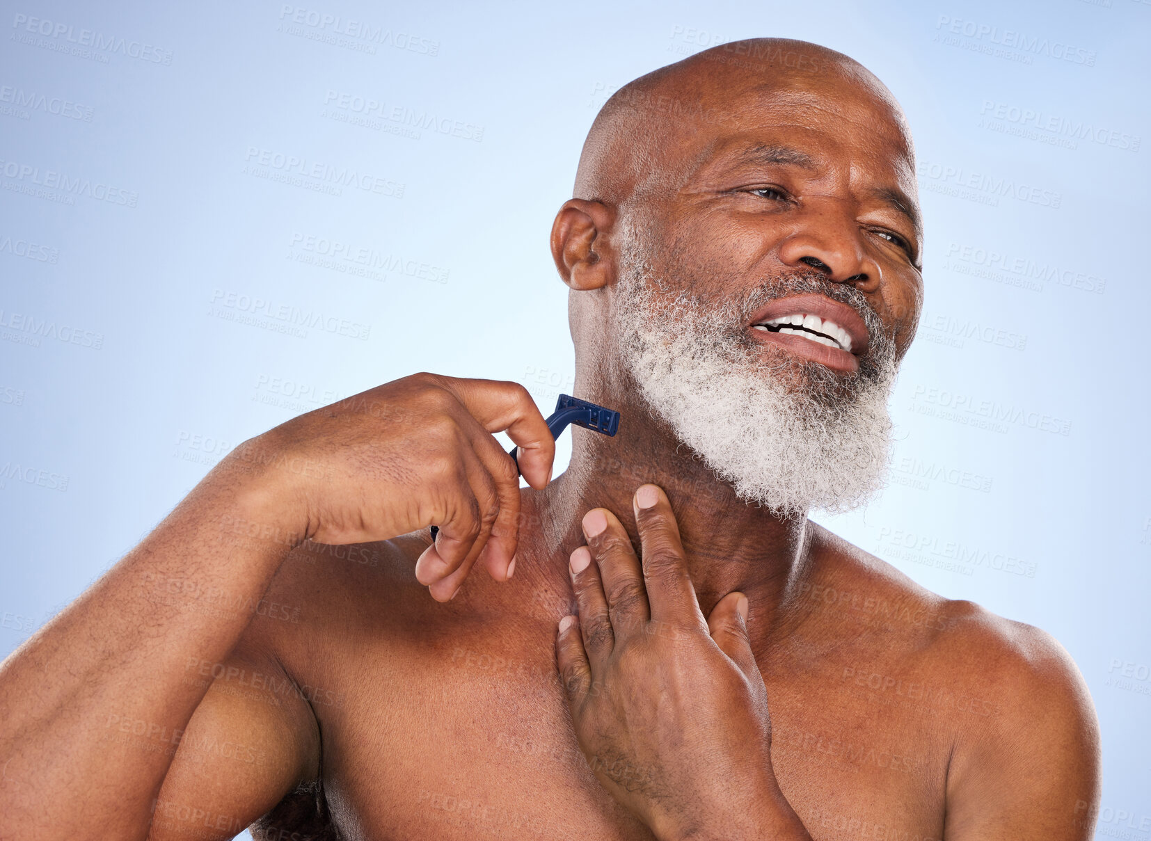 Buy stock photo Injury, shaving and man with beard in studio for grooming, hair removal or self care treatment. Accident, clean and mature male person with shaver for facial epilation routine by blue background.