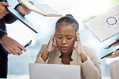 Buy stock photo Shot of a young businesswoman feeling overwhelmed while working in a busy office