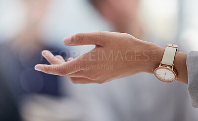 Buy stock photo Cropped shot of an unrecognisable businesswoman explaining to a group of colleagues in the office