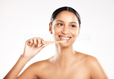 Buy stock photo Happy woman, toothbrush and brushing teeth for dental or clean hygiene against a white studio background. Female person or model with tooth brush and smile for oral, mouth or gum care on mockup space