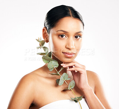 Buy stock photo Woman, portrait and plant for natural healthcare, skincare or beauty against a white studio background. Face of female person or model with green leaf, leaves or dermatology for sustainability