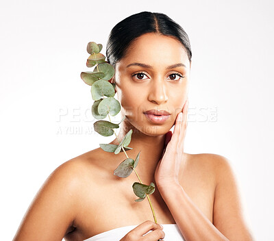 Buy stock photo Woman, portrait and plant for natural skincare, beauty or nature cosmetics against a white studio background. Face of female person or model with green leaf, leaves or dermatology for sustainability