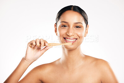 Buy stock photo Happy woman, portrait and toothbrush for clean teeth or dental hygiene against a white studio background. Female person or model with tooth brush and smile for oral, mouth or gum care on mockup space