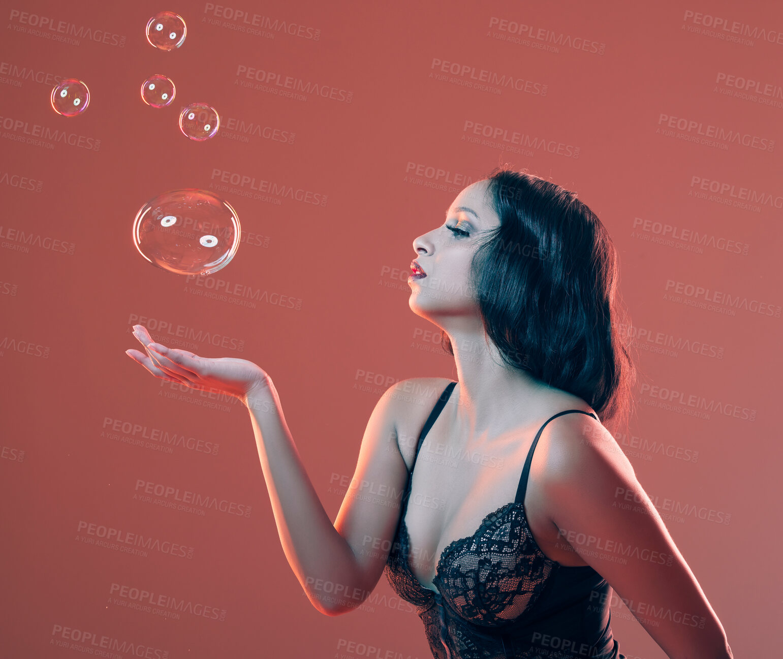 Buy stock photo Woman, lingerie and bubbles in studio with cosmetic confidence on red background, underwear or self care. Female person, model and bra with delicate beauty for bikini wellness, skincare or makeup