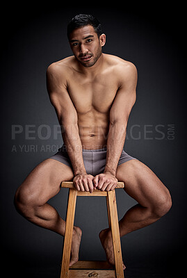 Buy stock photo Confident, portrait and man body in studio fitness, wellness and muscular care for inspiration on chair. Person, aesthetic and exercise with strength workout for health on stool by black background