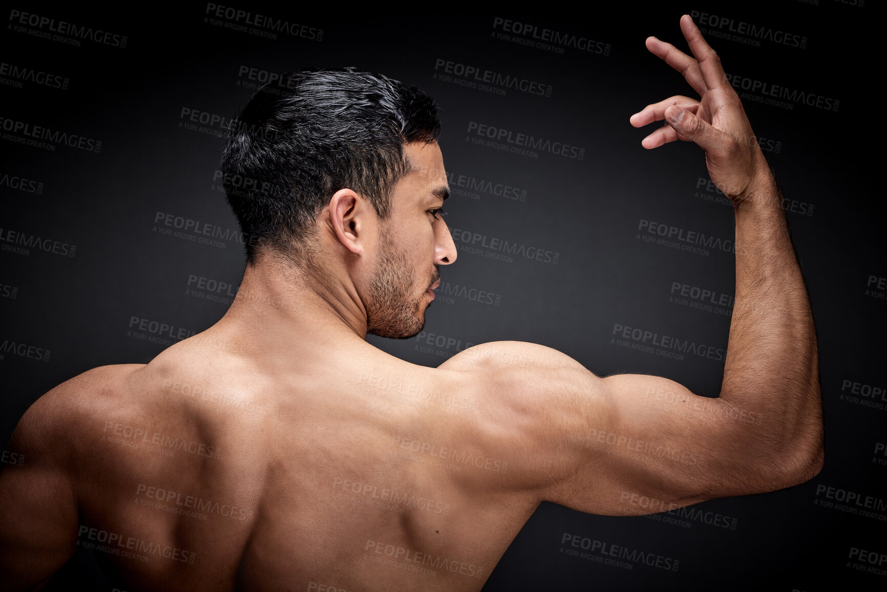 Buy stock photo Flex, man and bodybuilder with muscles in studio for bicep strength or strong body on dark background. Back, arm and male athlete for development, workout results or muscular forearm on mockup