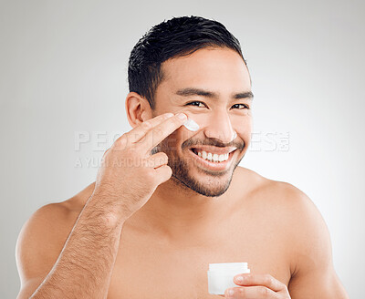 Buy stock photo Skincare, portrait and man with cream jar for beauty glow and facial results for healthy shine in studio. Male person, dermatology and sunscreen container with anti aging benefits by white background