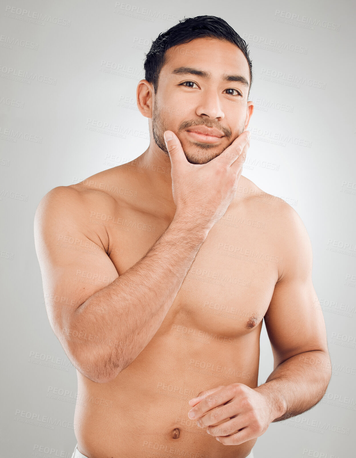 Buy stock photo Skincare, hand and portrait of man in studio with morning routine for hygiene, wellness or natural treatment on white background. Grooming, body and model for confidence, happiness or satisfaction