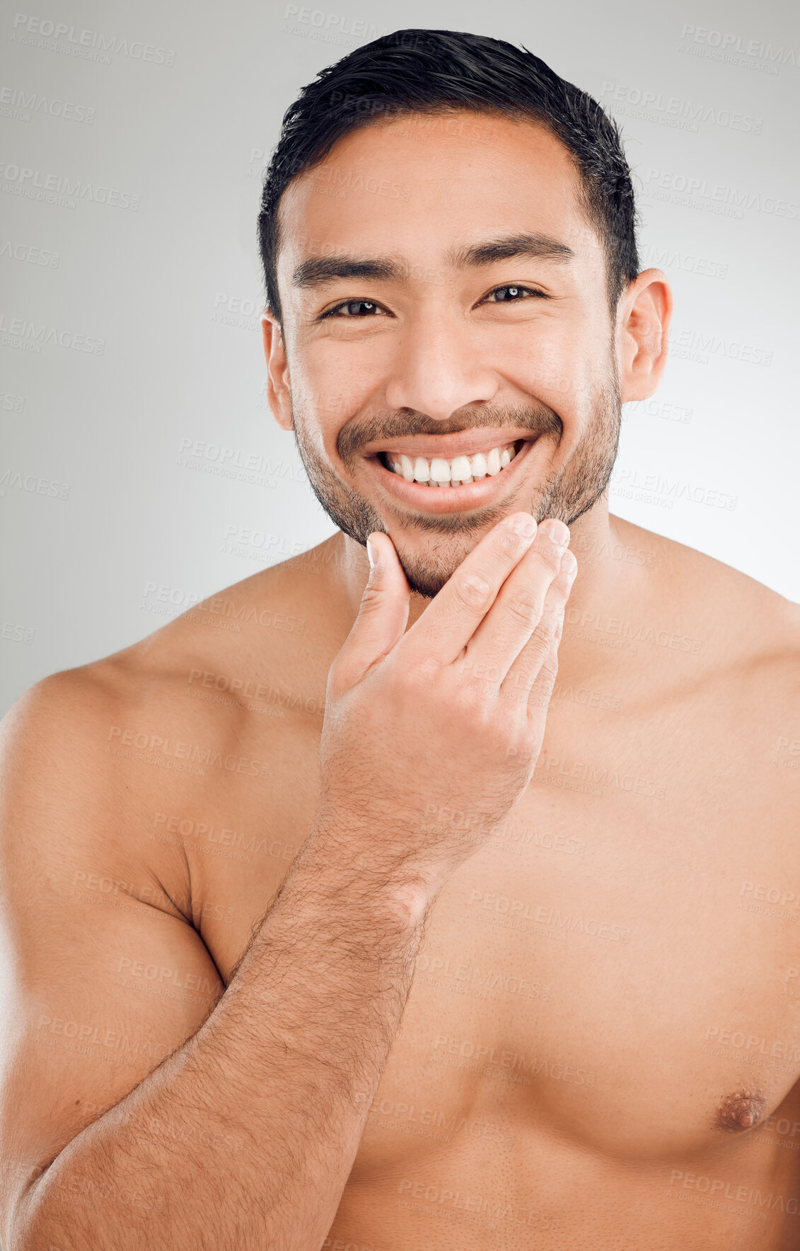 Buy stock photo Portrait, hand and skincare of happy man in studio with morning routine for hygiene, wellness or natural treatment on white background. Grooming, body and model for confidence, facial or satisfaction