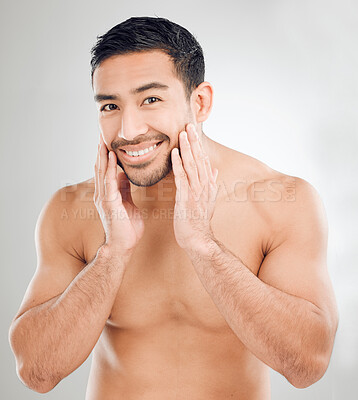 Buy stock photo Asian man, hands and portrait of skincare in studio for morning routine, wellness or natural treatment on white background. Grooming, body and model with smile for confidence, facial or satisfaction