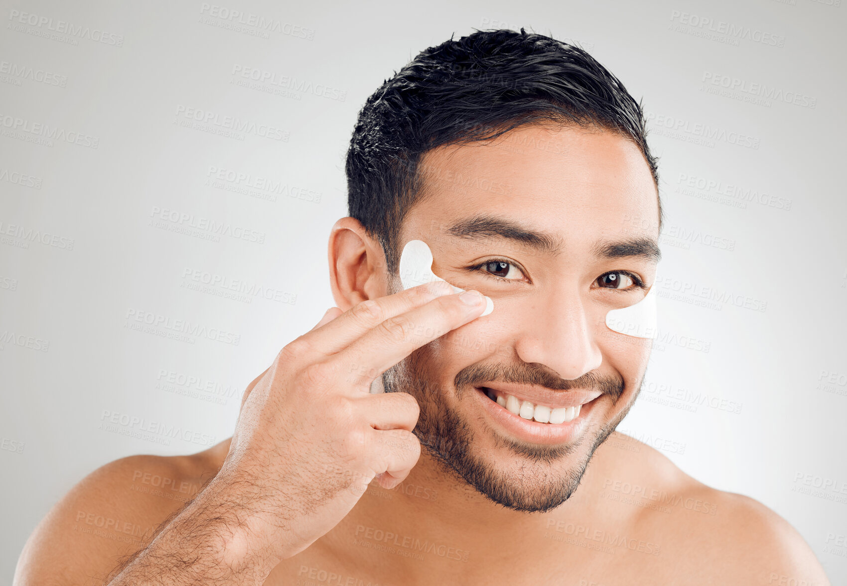 Buy stock photo Man, portrait and eye patches in studio mask, facial treatment and hydration on white background. Male person, skincare and beauty product for moisture, vitamin e and pads to pamper or cosmetics