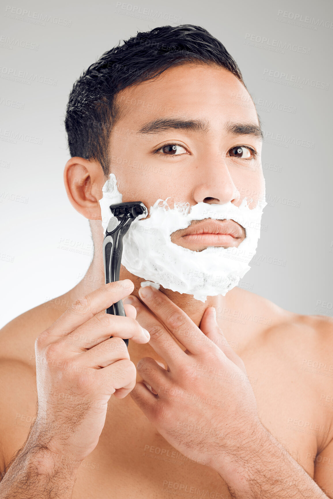 Buy stock photo Grooming, man and shaving cream in portrait, routine or wellness with facial foam for hygiene on studio background. Male person, razor and smooth face with cosmetics, skincare and hair removal