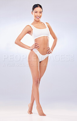 Buy stock photo Full length shot of an attractive young woman standing alone in the studio and posing in her underwear