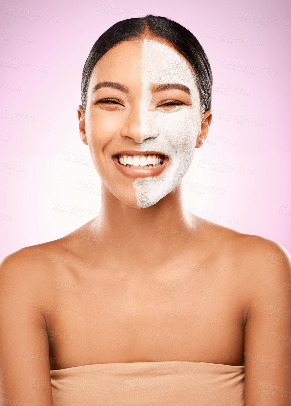 Buy stock photo Woman, facial mask and studio for clay treatment, detox and skincare or chemical peel on pink background. Female person, beauty and half for comparison results, cosmetics and exfoliate or dermatology