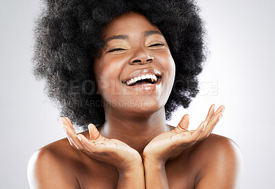 Buy stock photo Black woman, makeup portrait and afro with smile for natural glow, skin health and hair care in studio. African girl, beauty cosmetics and happy for skincare results and hairstyle by white background