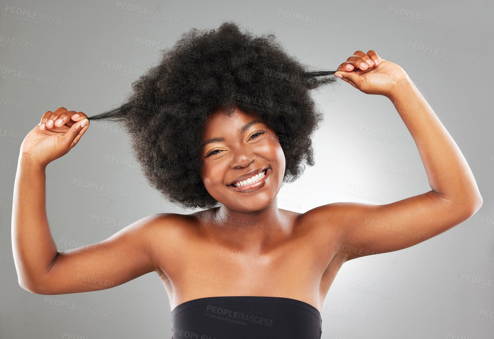 Buy stock photo Hands, black woman and afro with portrait for hair care, texture and glow for transformation in studio. Smile, model girl and beauty, wellness and growth for cosmetics and results by grey background