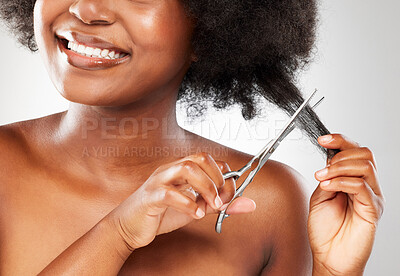 Buy stock photo Happy, afro and black woman with scissors for cutting, healthy growth or treatment for hairstyle. Female person, wellness and volume for texture or cosmetics for natural aesthetic on gray background