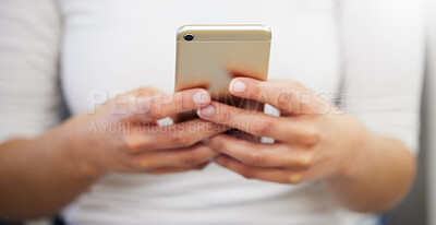 Buy stock photo Shot of a unrecognizable female using her phone