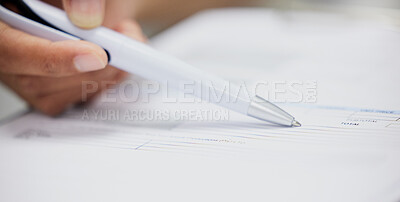 Buy stock photo Shot of an unrecognizable woman filling in a form on a desk in an office