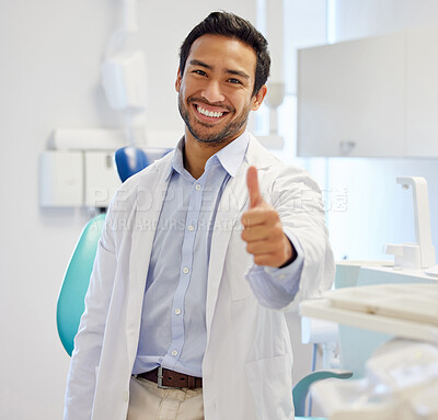 Buy stock photo Portrait, man and dentist with thumbs up, smile and oral care with happiness, specialist and professional. Face, male person or employee with dental hygiene, healthcare sector and support with review