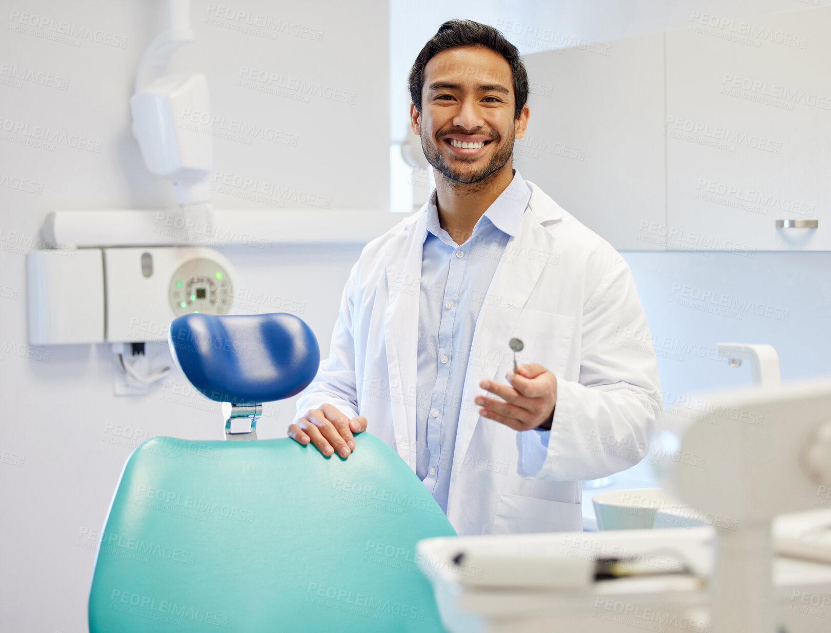 Buy stock photo Dentist, portrait and mouth mirror in clinic for consultation, oral hygiene or medical procedure. Service, smile and man doctor with equipment for teeth examination, orthodontics or dental care