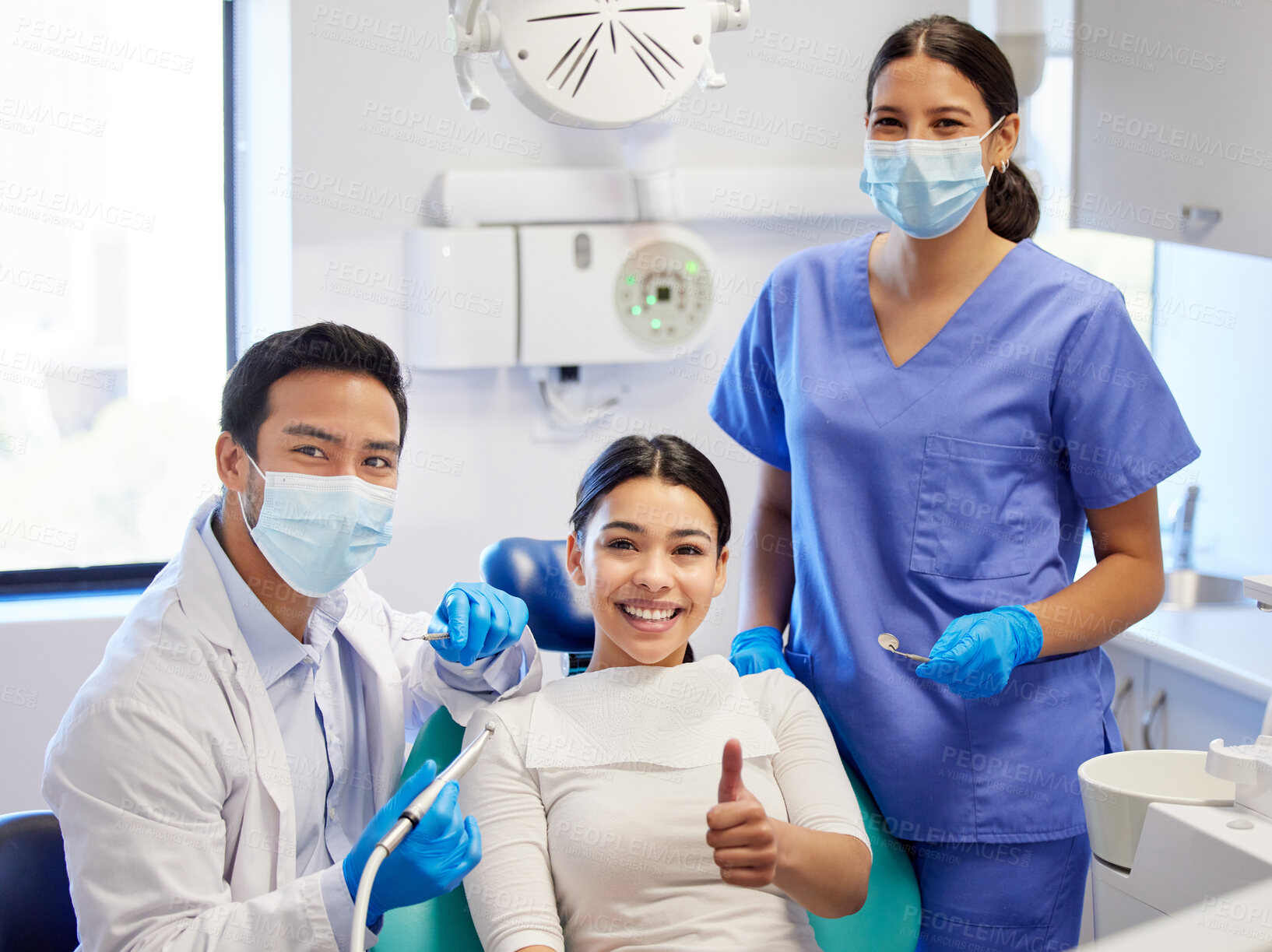 Buy stock photo Dentist, patient and smile with portrait for thumbs up for success of teeth whitening, oral and dental care. Doctor, assistant and woman with hand gesture for well done or good job, yes and thank you