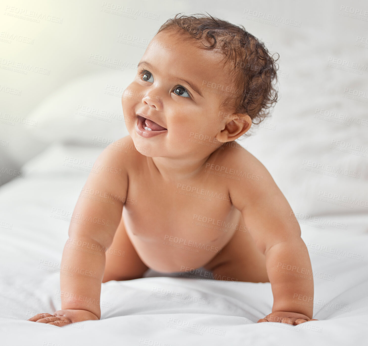 Buy stock photo Child development, cute and smile with baby on bed in home for growth, having fun or playing. Adorable, balance and innocent with happy newborn infant learning to crawl in bedroom of apartment