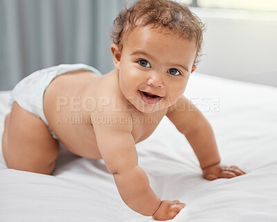 Buy stock photo Child development, cute and portrait with baby on bed in home for growth, having fun or playing. Adorable, balance and diaper with innocent newborn infant learning to crawl in bedroom of apartment