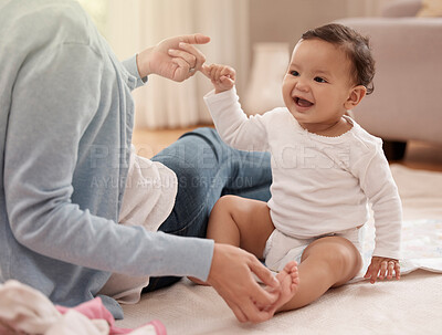 Buy stock photo Baby, mom and happy playing on nursery floor for healthy growth, bonding together and love relationship in home. Nanny lady, newborn girl and smile for babysitter career, support and development