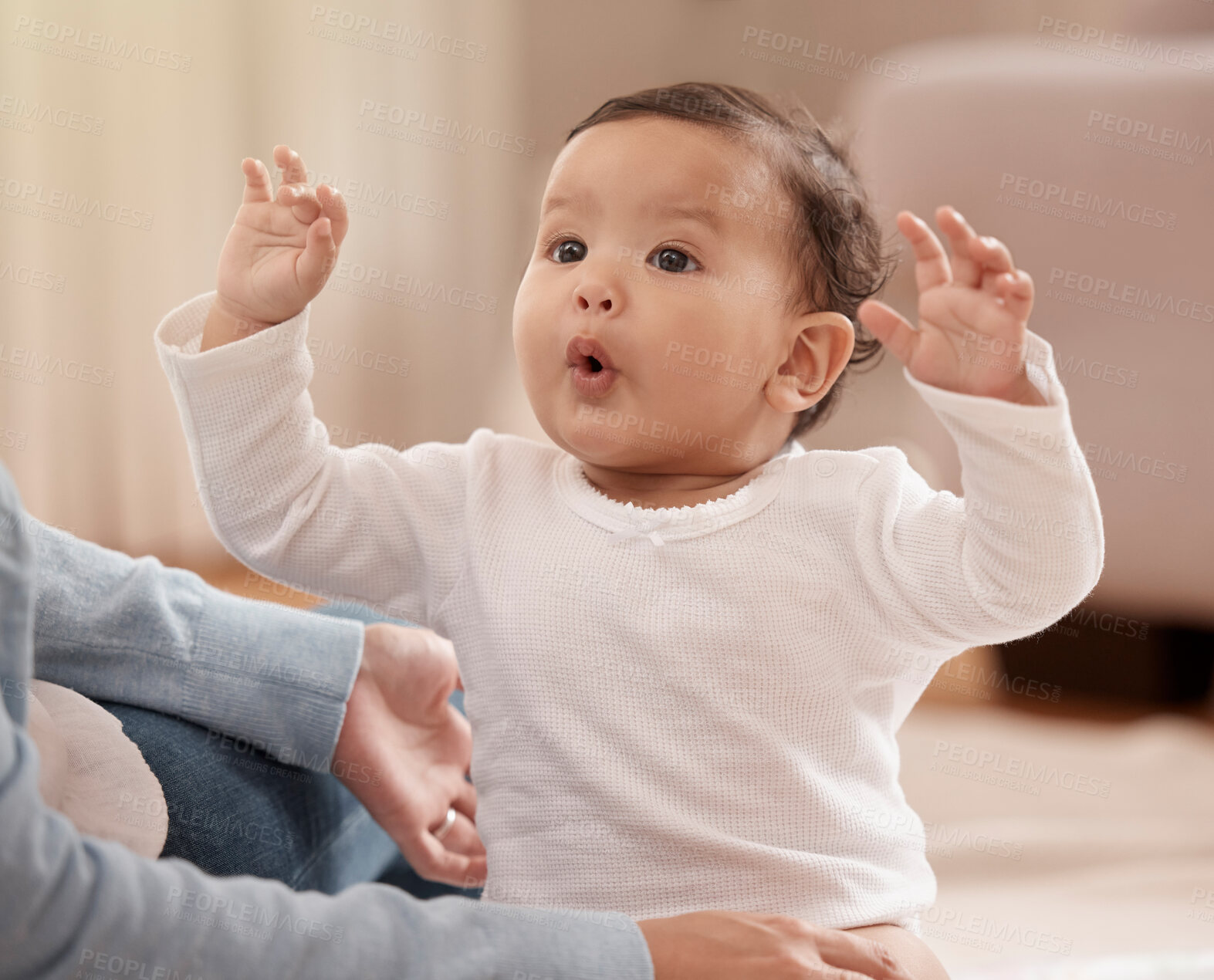 Buy stock photo Baby, excited and hands of mom in home for development, motor skills and bonding in living room. Mother, infant and dress for day with care, energy and trust in parent for wellness and security