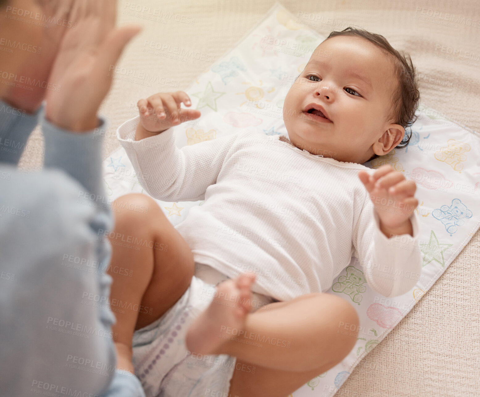 Buy stock photo Cheerful baby, mother and care for diaper change with playing, home and nursery for child development. Happy, girl and woman for bonding, motor skills and nurture with health, hygiene and comfort