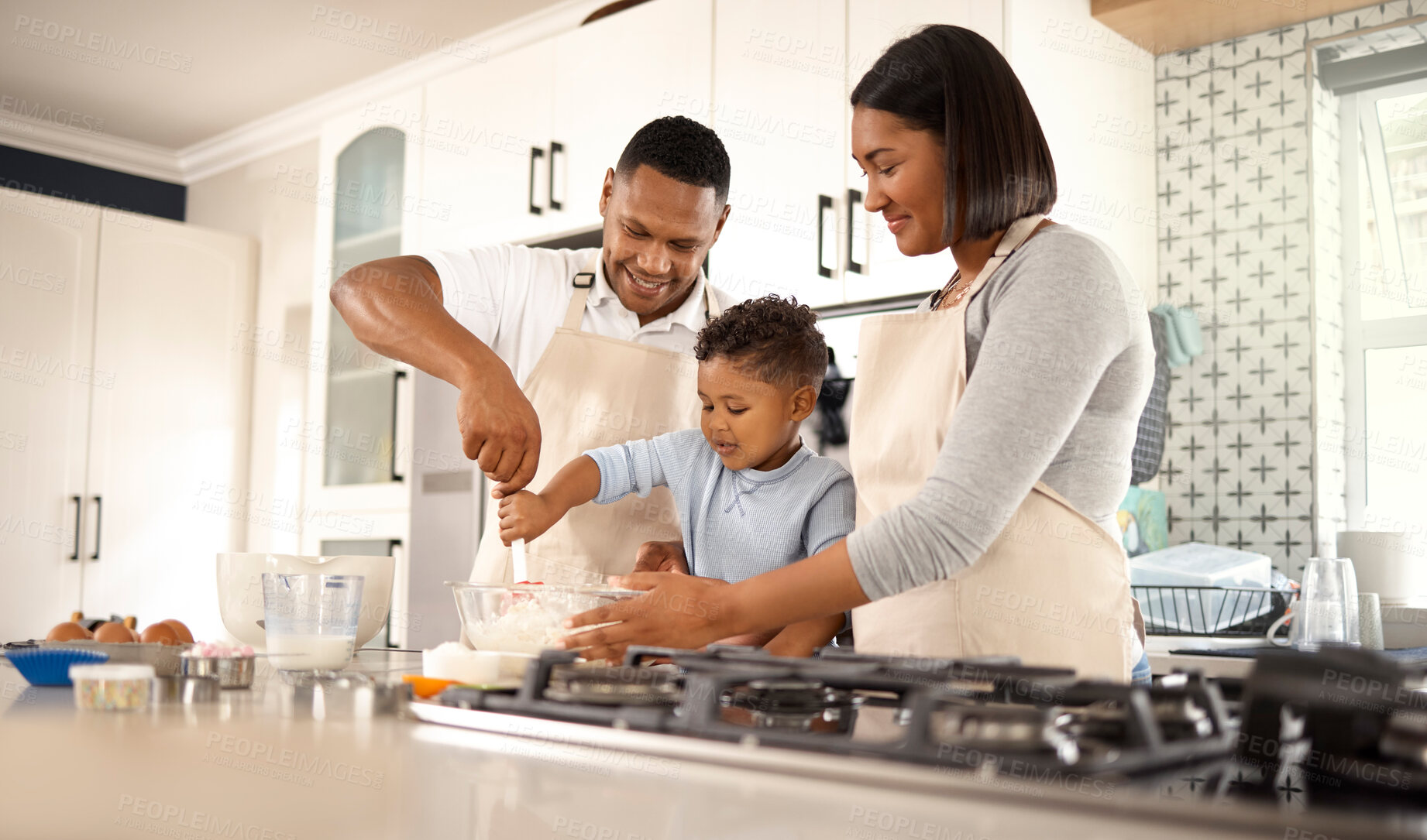 Buy stock photo Family, kid and parents baking in kitchen for learning, teaching and help to mix dough. Happy mother, father and child cooking with flour for dessert recipe, pastry and food with ingredients in home