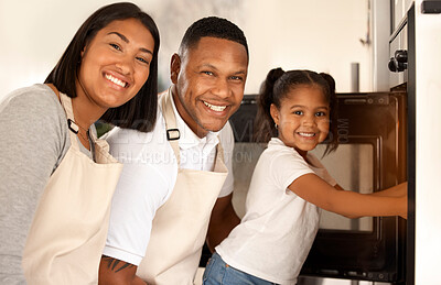 Buy stock photo Family, kid and portrait of parents baking at oven in kitchen for learning, help or teaching girl. Happy mother, father and face of child cooking at small business, startup or bakery at stove in home