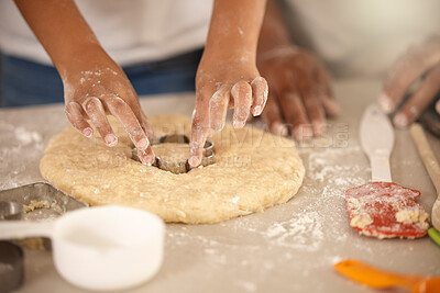 Buy stock photo Hands, child and cookie cutter in kitchen for baking, together and dessert for nutrition. Food, parent and flour for cooking and party or birthday with ingredients in home for recipe, sweets or snack