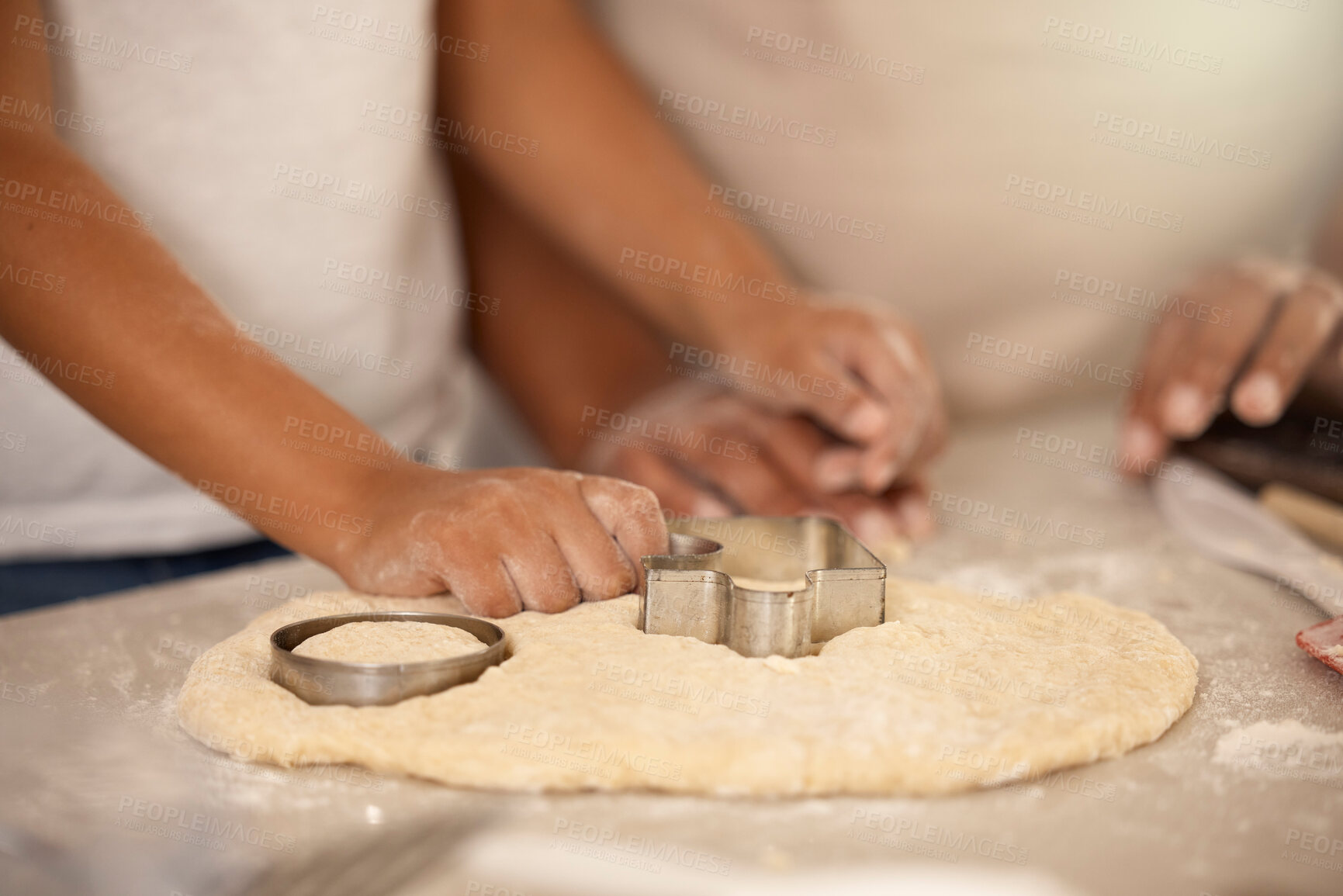 Buy stock photo Hands, flour and cookie cutter in kitchen for baking, together and dessert for nutrition. Food, chef and friends for cooking and party or birthday with wellness and recipe in home for sweets or snack